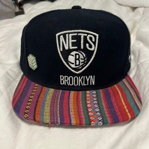 Brooklyn nets black Adidas snap back with striped colors